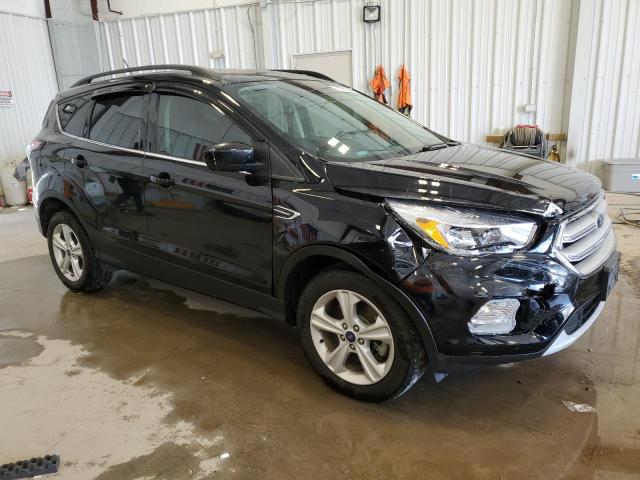 Photo 4 from auction – 2018 FORD ESCAPE SE with VIN 1FMCU9GD9JUB06550