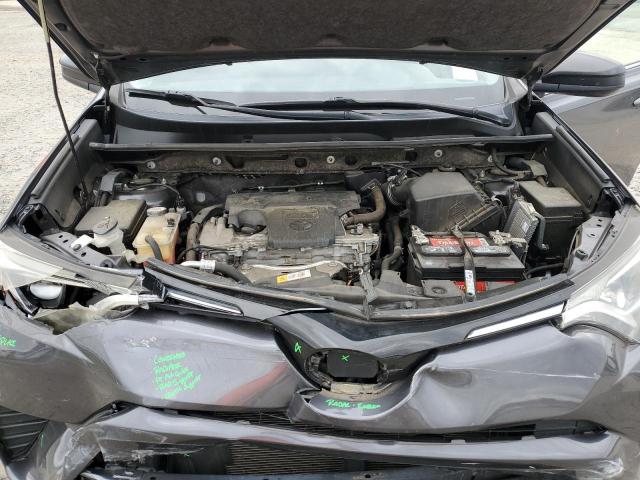 Photo 11 from auction – 2018 TOYOTA RAV4 LE with VIN JTMZFREV0JJ152452