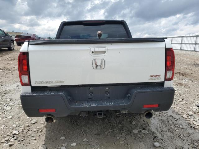 Photo 6 from auction – 2021 HONDA RIDGELINE with VIN 5FPYK3F11MB014406