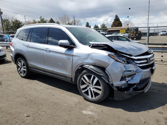 Photo 4 from auction – 2016 HONDA PILOT ELIT with VIN 5FNYF6H05GB120106