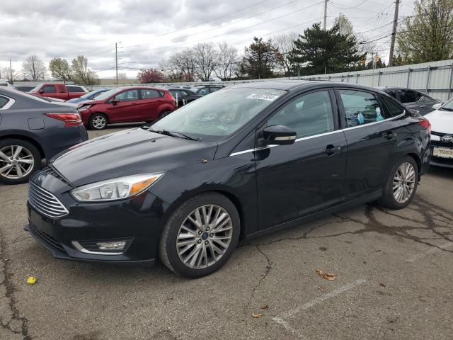 FORD FOCUS TITA 2016 with VIN 1FADP3J25GL274940 - Photo from auction