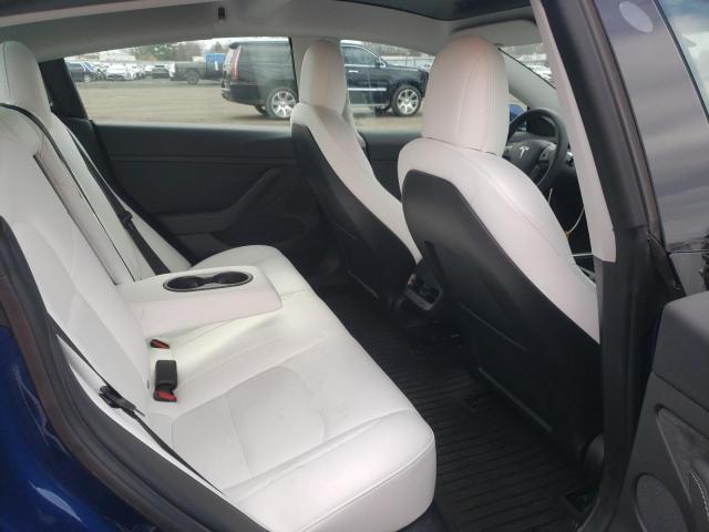 Снимка 10 от търг – 2022 TESLA MODEL 3 с VIN 5YJ3E1EB0NF104060