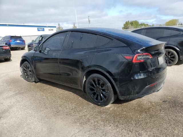 Photo 2 from auction – 2021 TESLA MODEL Y with VIN 5YJYGAEE0MF144423