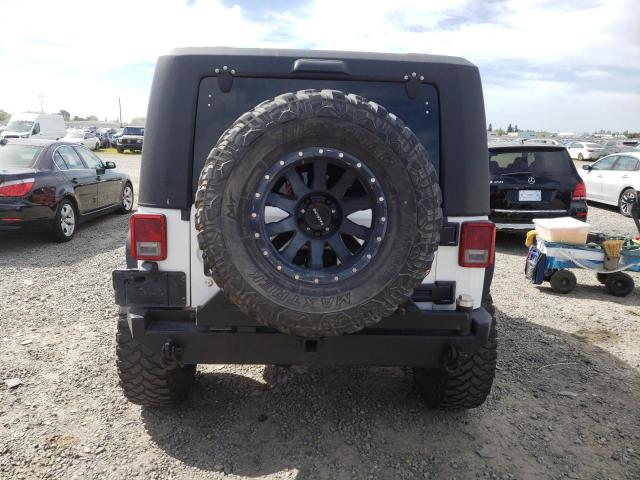 Photo 6 from auction – 2012 JEEP WRANGLER U with VIN 1C4BJWDG5CL172074