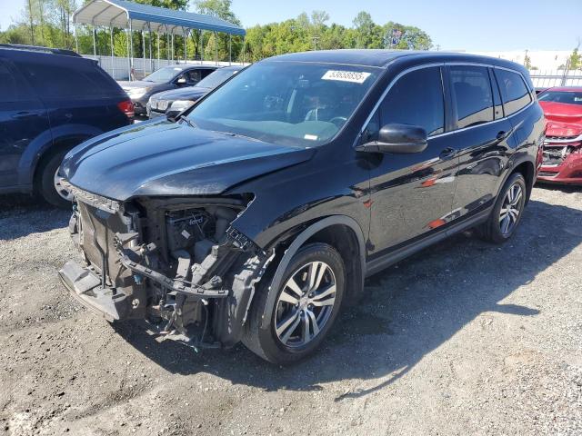 HONDA PILOT 2018 with VIN 5FNYF6H70JB003988 - Photo from auction