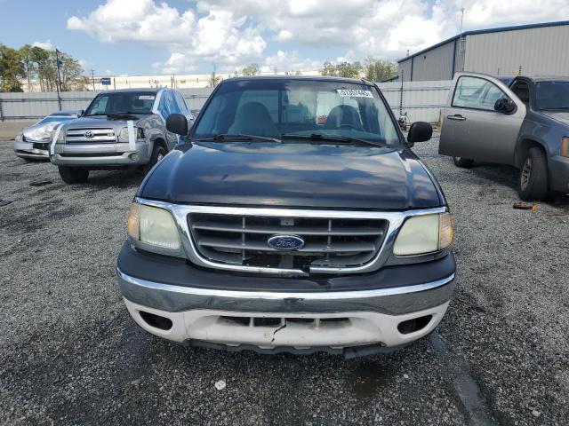 Photo 5 from auction – 2003 FORD F150 with VIN 1FTRF07W33KB30301