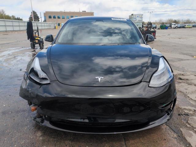 Photo 5 from auction – 2023 TESLA MODEL 3 with VIN 5YJ3E1ECXPF628019