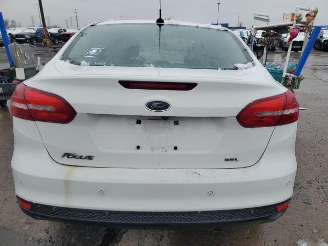 Снимка 6 от търг – 2017 FORD FOCUS SEL с VIN 1FADP3H27HL209885