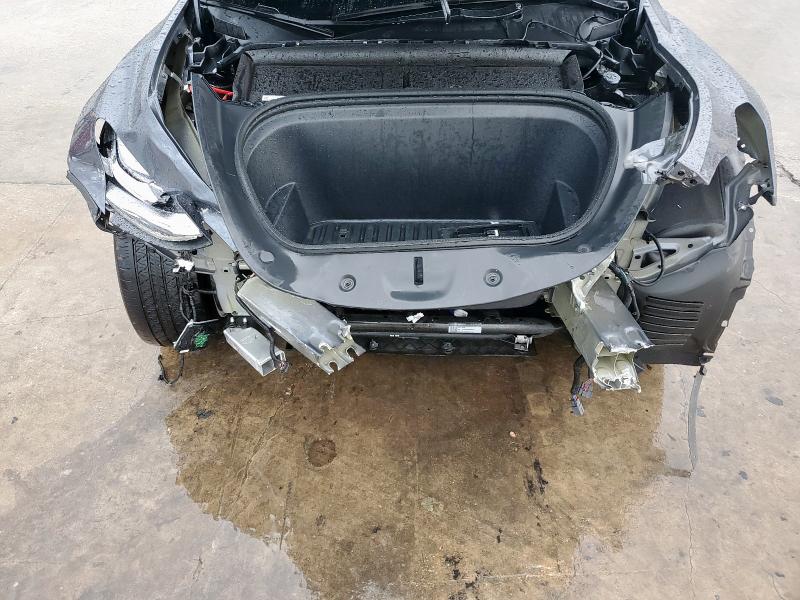 Photo 11 from auction – 2023 TESLA MODEL Y with VIN 7SAYGDEE5PA061740