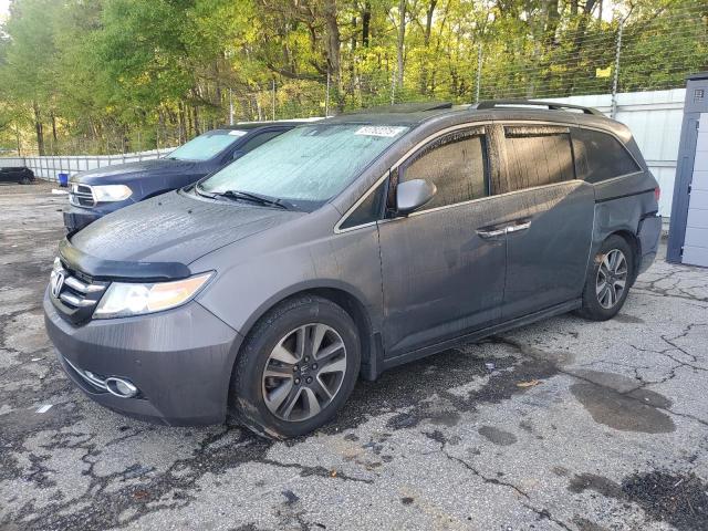 Photo 1 from auction – 2014 HONDA ODYSSEY TO with VIN 5FNRL5H99EB082995