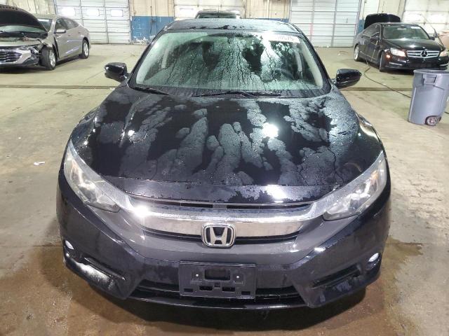 Photo 5 from auction – 2016 HONDA CIVIC EX with VIN 19XFC1F36GE029013