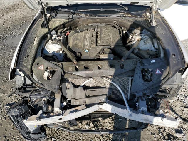 Photo 11 from auction – 2014 BMW 740 with VIN WBAYA6C58ED144242