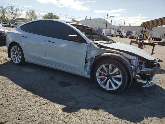Photo 4 from auction – 2022 TESLA MODEL 3 with VIN 5YJ3E1EC9NF317324