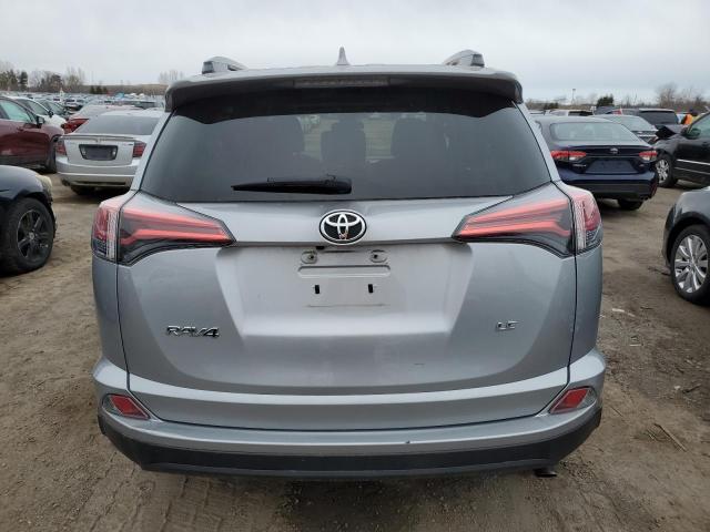Photo 6 from auction – 2018 TOYOTA RAV4 LE with VIN 2T3ZFREV1JW483638