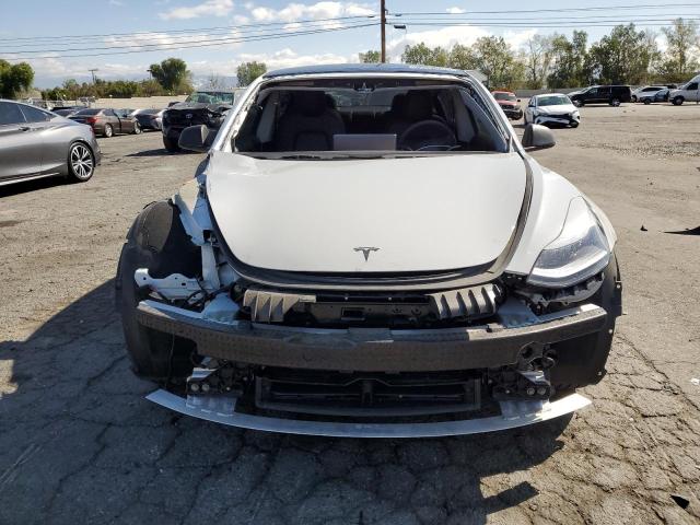 Photo 5 from auction – 2022 TESLA MODEL 3 with VIN 5YJ3E1EC9NF317324