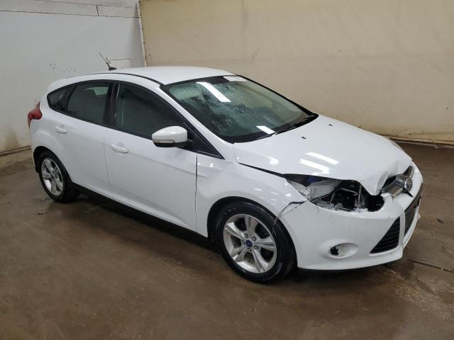 Photo 4 from auction – 2014 FORD FOCUS SE with VIN 1FADP3K29EL335654