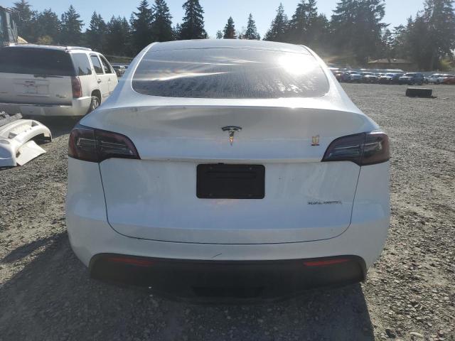 Photo 6 from auction – 2023 TESLA MODEL Y with VIN 7SAYGDEE9PA082428