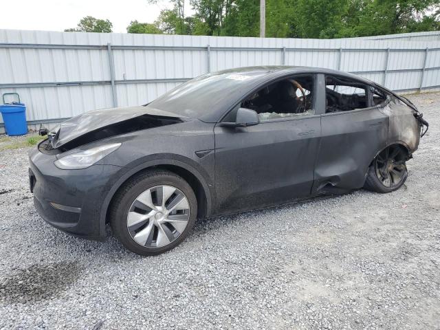 TESLA MODEL Y 2022 with VIN 7SAYGDEE9NF318852 - Photo from auction