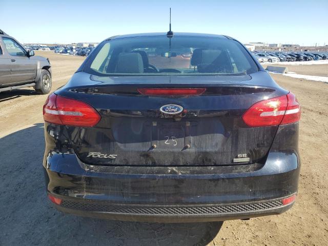 Снимка 6 от търг – 2017 FORD FOCUS SE с VIN 1FADP3FE3HL236319