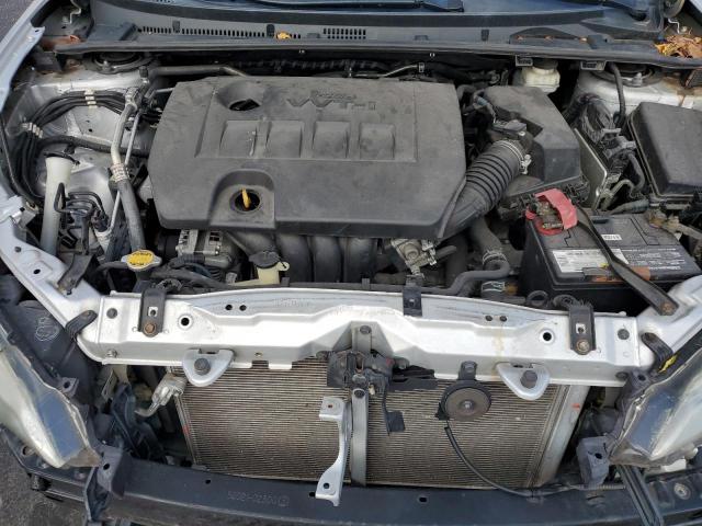 Снимка 11 от търг – 2014 TOYOTA COROLLA L с VIN 5YFBURHE2EP081629