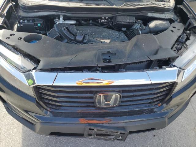 Photo 12 from auction – 2023 HONDA RIDGELINE with VIN 5FPYK3F74PB044766