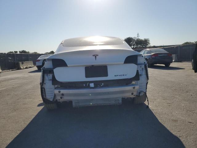 Photo 6 from auction – 2021 TESLA MODEL 3 with VIN 5YJ3E1EA9MF838301