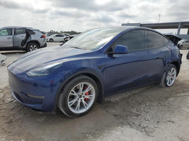 TESLA MODEL Y 2022 with VIN 7SAYGDEE2NF395904 - Photo from auction
