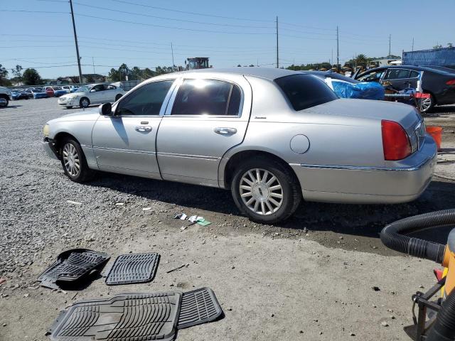 Photo 2 from auction – 2004 LINCOLN TOWN CAR E with VIN 1LNHM81W04Y651382