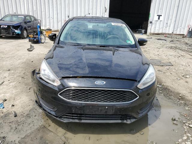 Photo 5 from auction – 2016 FORD FOCUS SE with VIN 1FADP3F21GL334852