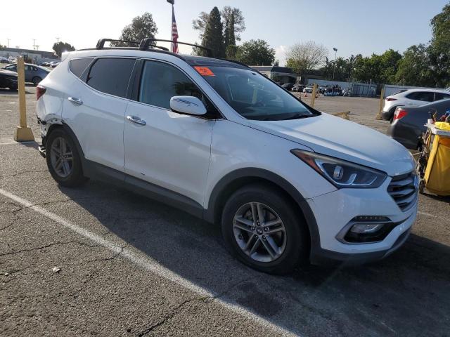 Photo 4 from auction – 2017 HYUNDAI SANTA FE S with VIN 5NMZU3LB3HH034665