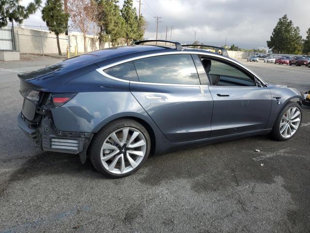 Снимка 3 от търг – 2018 TESLA MODEL 3 с VIN 5YJ3E1EA6JF042827