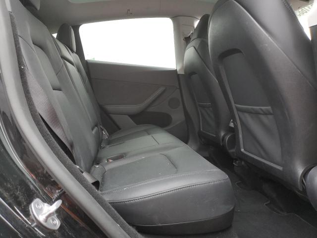Photo 11 from auction – 2023 TESLA MODEL Y with VIN 7SAYGDEE7PA143291