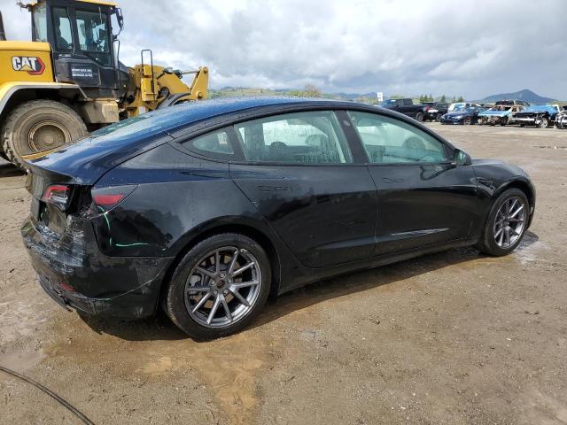 Снимка 3 от търг – 2022 TESLA MODEL 3 с VIN 5YJ3E1EA7NF289649