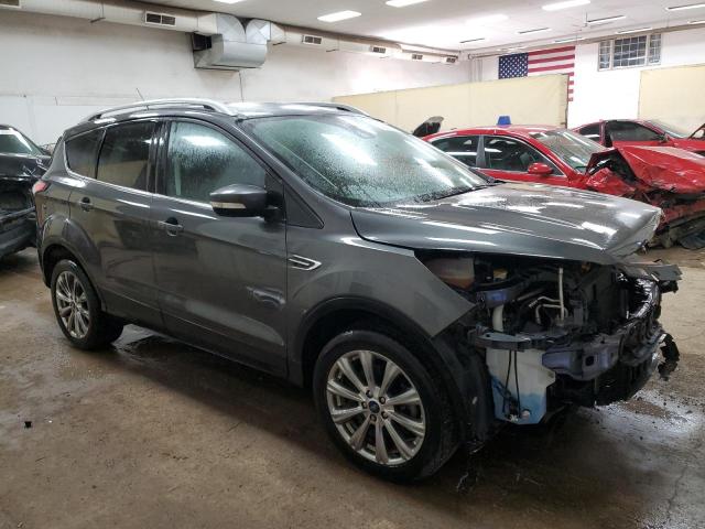 Photo 4 from auction – 2018 FORD ESCAPE TIT with VIN 1FMCU9J95JUC79843