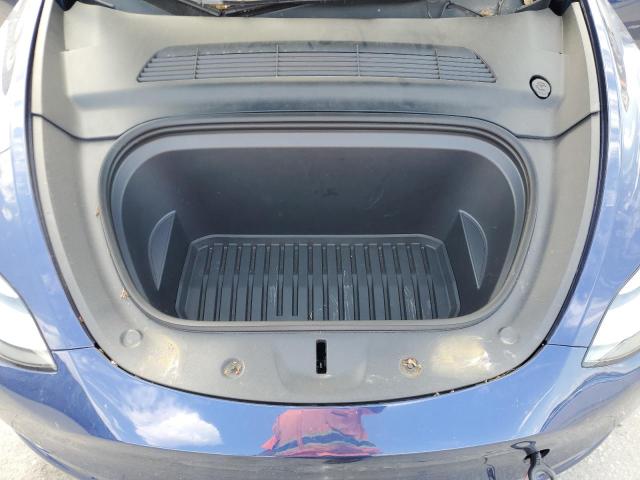Photo 12 from auction – 2022 TESLA MODEL Y with VIN 7SAYGAEE2NF390507