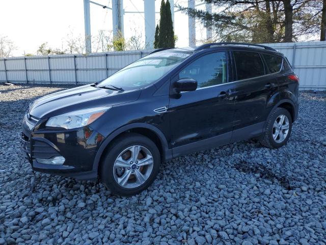 FORD ESCAPE SE 2016 with VIN 1FMCU9GX4GUC04677 - Photo from auction