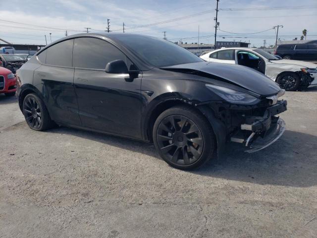 Photo 4 from auction – 2021 TESLA MODEL Y with VIN 5YJYGAEE0MF203308