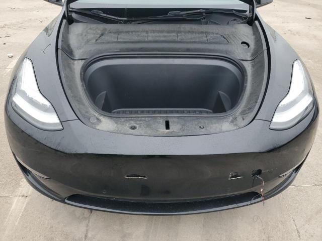 Photo 11 from auction – 2022 TESLA MODEL Y with VIN 7SAYGAEE1NF381491