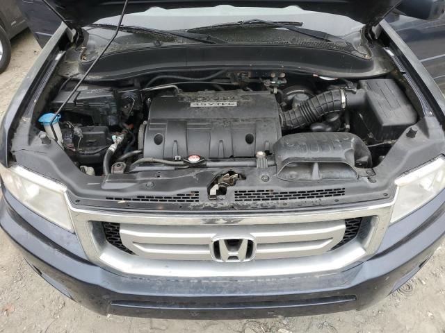 Photo 12 from auction – 2009 HONDA RIDGELINE with VIN 5FPYK16569B108845