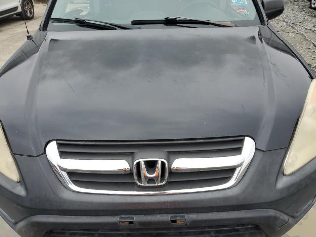 Photo 11 from auction – 2002 HONDA CR-V LX with VIN JHLRD68452C007083