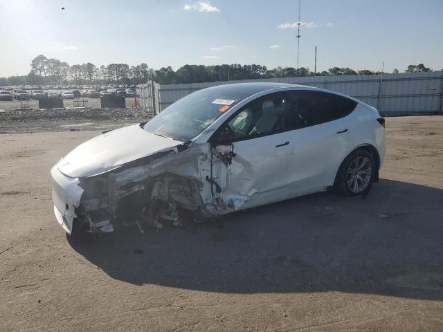 TESLA MODEL Y 2024 with VIN 7SAYGDEE6RA259956 - Photo from auction