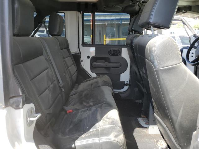 Photo 11 from auction – 2009 JEEP WRANGLER U with VIN 1J4GA39129L746089