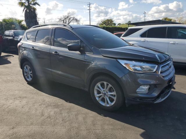Photo 4 from auction – 2018 FORD ESCAPE with VIN 1FMCU0GD1JUC36933