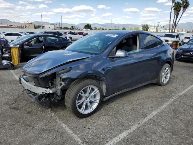 Снимка 1 от търг – 2023 TESLA MODEL Y с VIN 7SAYGDEE1PF638220