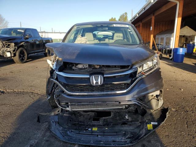 Photo 5 from auction – 2016 HONDA CR-V LX with VIN 5J6RM4H39GL133280