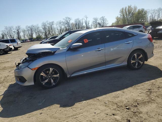 HONDA CIVIC TOUR 2016 with VIN 19XFC1F91GE221802 - Photo from auction