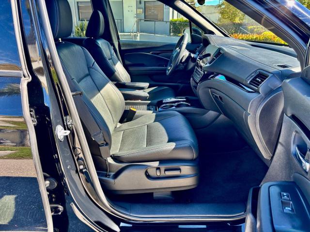 Photo 5 from auction – 2021 HONDA PASSPORT E with VIN 5FNYF8H01MB013559