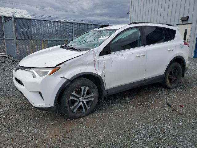 TOYOTA RAV4 LE 2017 with VIN 2T3BFREV8HW633207 - Photo from auction