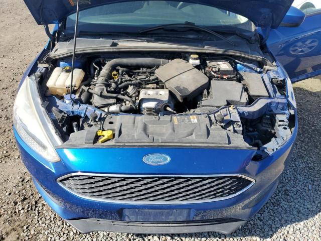 Снимка 11 от търг – 2018 FORD FOCUS SE с VIN 1FADP3FE4JL223973