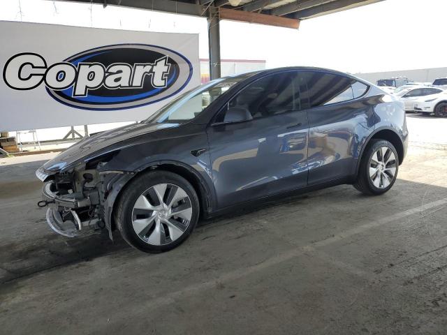 TESLA MODEL Y 2023 with VIN 7SAYGDEE0PF646194 - Photo from auction